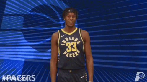 A Basketball Player For The Indiana Pacers Celebrates With His Arms Outstretched GIF