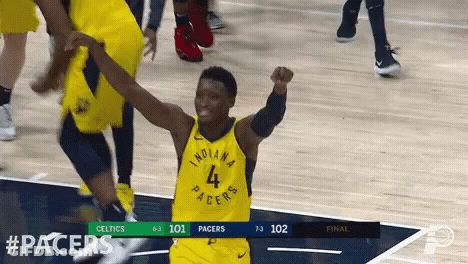 A Basketball Player For The Indiana Pacers Is Celebrating On The Court GIF
