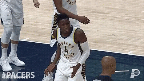 A Basketball Player For The Indiana Pacers Is Standing On The Court GIF