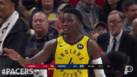 A Basketball Player For The Indiana Pacers Stands In Front Of A Crowd During A Game GIF