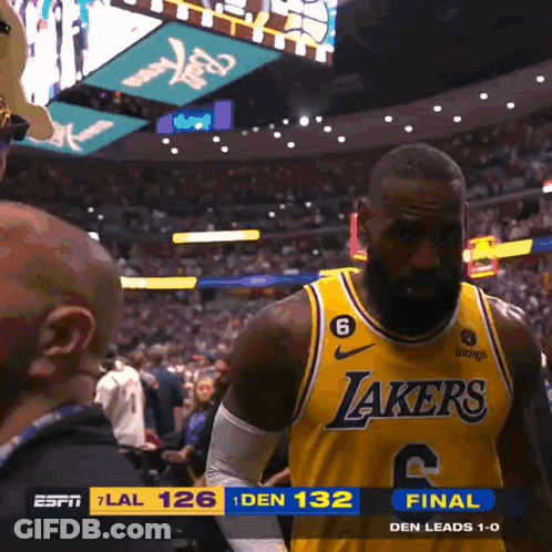 A Basketball Player For The Lakers Stands In Front Of A Crowd GIF