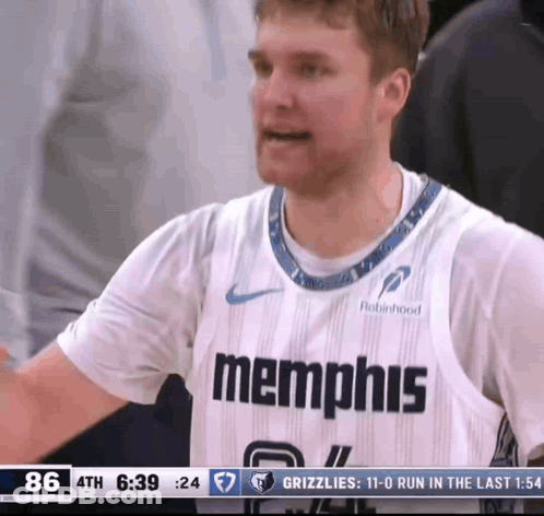 A Basketball Player For The Memphis Grizzlies Looks To His Left GIF