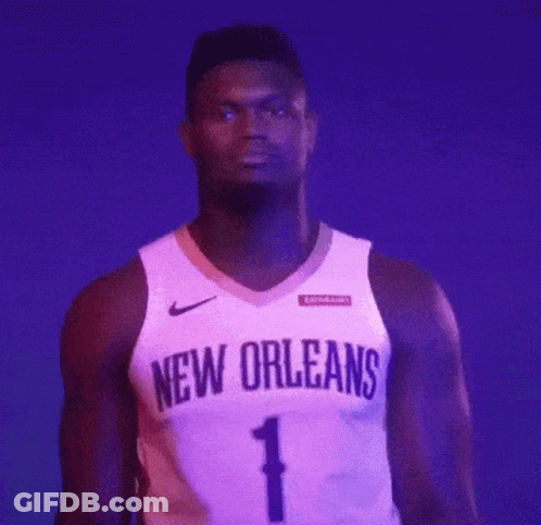 A Basketball Player For The New Orleans Is Standing In Front Of A Purple Background GIF