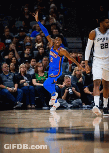 A Basketball Player For The Oklahoma City Thunder Jumps In The Air During A Game GIF