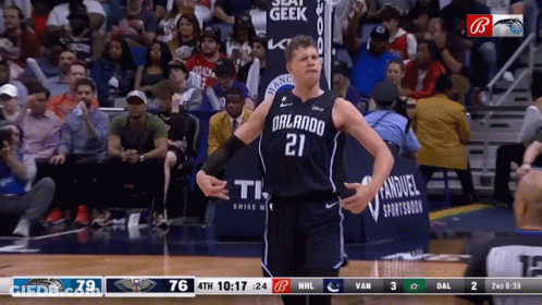 A Basketball Player For The Orlando Magic Stands In Front Of A Crowd GIF