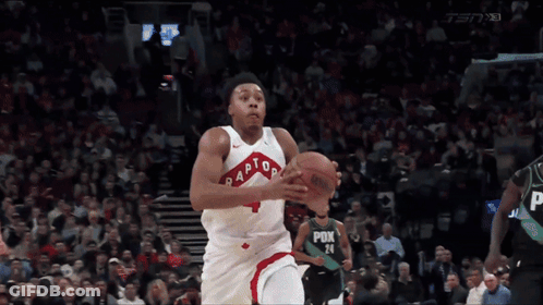 A Basketball Player For The Raptors Is Dribbling A Basketball GIF
