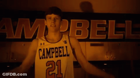 A Basketball Player From Campbell Flexes His Muscles GIF