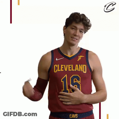 A Basketball Player From The Cleveland Cavs Flexes His Muscles GIF