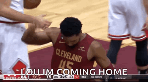 A Basketball Player From The Cleveland Team Is Being Congratulated GIF