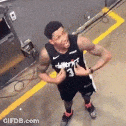 A Basketball Player In A Black Jersey With The Number 3 On It GIF