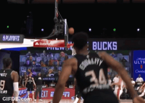 A Basketball Player In A Black Jersey With The Number 34 On It GIF