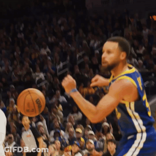A Basketball Player In A Blue And Yellow Jersey With The Number 23 On It GIF
