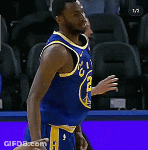 A Basketball Player In A Blue Jersey With The Number 23 On The Front GIF