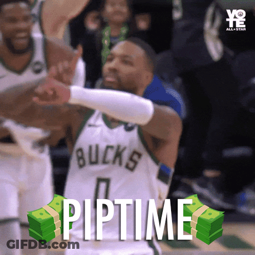 A Basketball Player In A Bucks Jersey Is Giving A High Five GIF