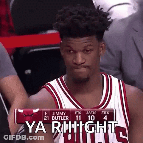 A Basketball Player In A Bulls Jersey Is Sitting In The Stands Watching A Game . GIF