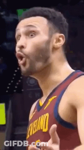 A Basketball Player In A Cleveland Jersey Is Making A Funny Face . GIF