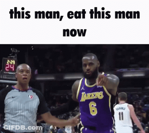A Basketball Player In A Lakers Jersey Is Pointing At The Camera GIF