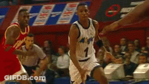 A Basketball Player In A Magic Jersey Is Dribbling A Ball GIF