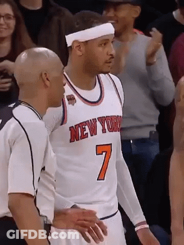 A Basketball Player In A New York Jersey Is Talking To A Referee GIF