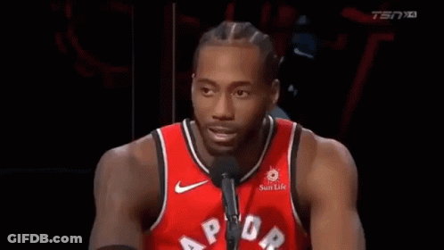 Basketball Player In Red Jersey Talking Into Microphone GIF