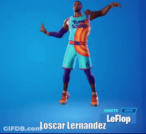 A Basketball Player In A Tune Squad Uniform Is Dancing GIF