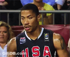 A Basketball Player In A Usa Jersey Stands In Front Of A Crowd GIF