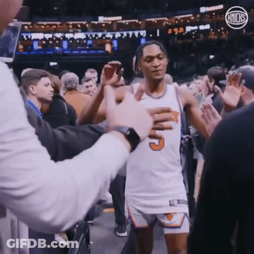 A Basketball Player In A White Jersey With The Number 5 On It GIF