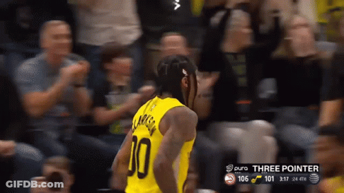 A Basketball Player In A Yellow Jersey With The Number 10 On It GIF