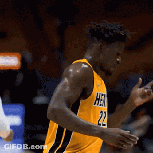 A Basketball Player In A Yellow Jersey With The Number 22 On It GIF
