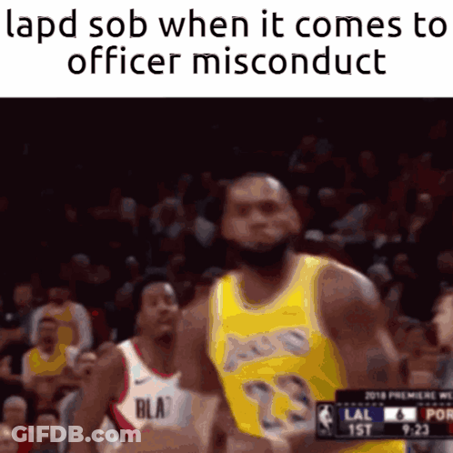 A Basketball Player In A Yellow Lakers Jersey Is Running Towards A Police Officer GIF