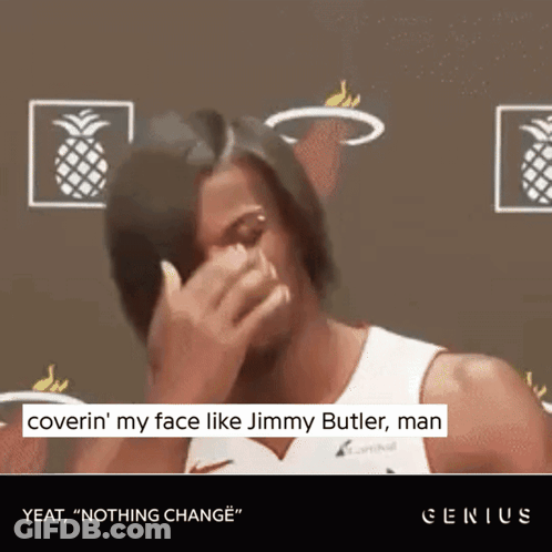 A Basketball Player Is Covering His Face With His Hand And Says " Coverin ' My Face Like Jimmy Butler Man Yeat " GIF