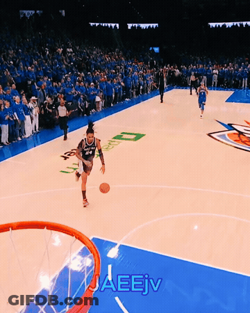 A Basketball Player Is Dribbling A Ball On A Court With The Word Jaeev Written On The Bottom GIF
