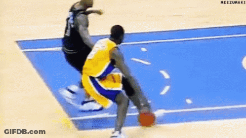 A Basketball Player Is Dribbling A Basketball On A Blue Court . GIF