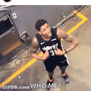 A Basketball Player Is Giving A Thumbs Up In A Parking Lot And Asking Who Me ? GIF