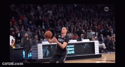 A Basketball Player Is Jumping In The Air With The Tnt Logo In The Corner GIF