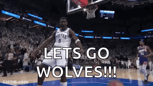 A Basketball Player Is Jumping In The Air With The Words `` Let 'S Go Wolves '' Written On The Screen . GIF