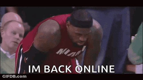 A Basketball Player Is Kneeling Down And Saying `` Im Back Online '' GIF
