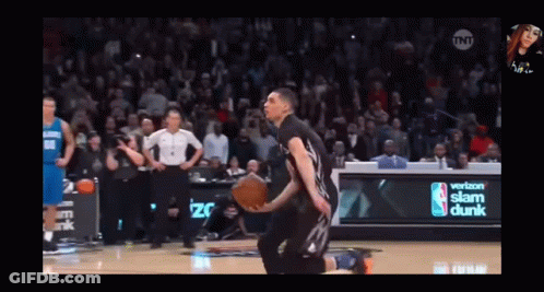 A Basketball Player Is Kneeling On The Court In Front Of A Verizon Sign GIF