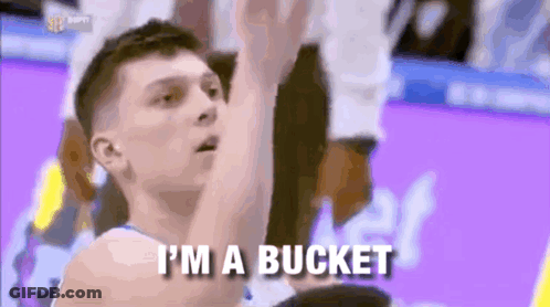 A Basketball Player Is Saying I 'M A Bucket While Holding A Basketball . GIF