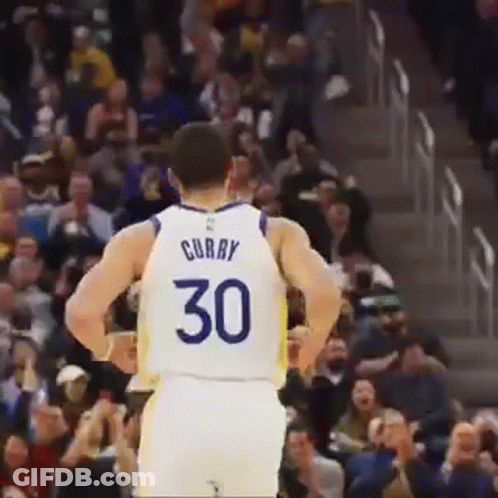 A Basketball Player Is Standing In Front Of A Crowd Wearing A Number 30 Jersey . GIF