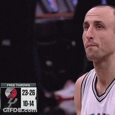 A Basketball Player Is Standing In Front Of A Scoreboard With A Sign That Says Free Throws . GIF