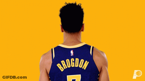 A Basketball Player Named Brogdon Flexes His Muscles GIF