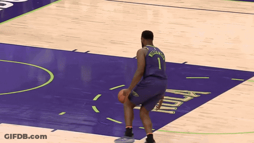 A Basketball Player Named Williamson Is Kneeling Down On The Court GIF