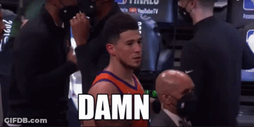 A Basketball Player Standing In A Locker Room With The Word Damn Written On The Screen GIF