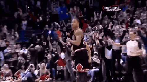 A Basketball Player Stands In Front Of A Crowd With A Comcast Sportsnet Logo GIF