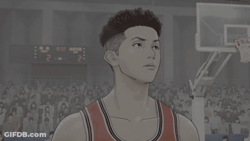 A Basketball Player Stands In Front Of A Scoreboard That Says 2 To 1 GIF