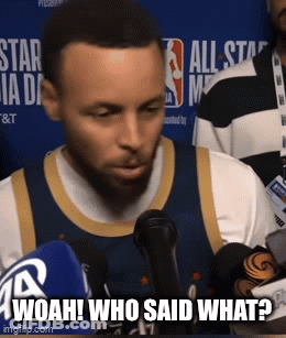 A Basketball Player Talking Into A Microphone With The Words Woah Who Said What Written Below Him GIF