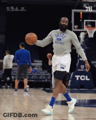 A Basketball Player Wearing A 76Ers Shirt Holds A Basketball GIF