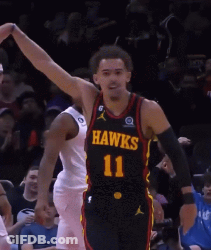 A Basketball Player Wearing A Black Jersey With The Number 11 GIF