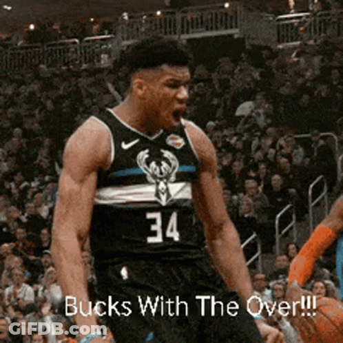 A Basketball Player Wearing A Black Jersey With The Number 34 On It GIF